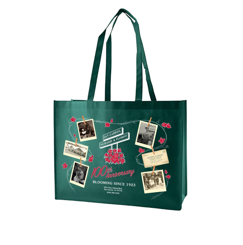 This tote bag is part of the Anniversary pack. Eco friendly green tote bag featuring graphics of San Gabriel Nursery and Florist historic photos, signage and text that announces 100th anniversary Blooming since 1923 and business address
